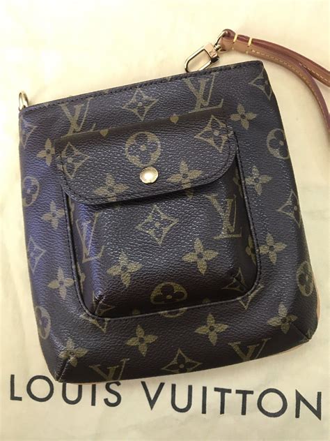 louis vuitton partition wristlet bag|louis vuitton shiny bag.